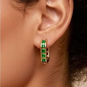 Dainty gold hoop earrings with green CZ
